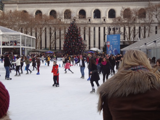 Ice skating in Bryant Park.  That's the New York Public Library in the background.  Surrounding all this are scores of gift kiosks and places to grab a quick bite to eat.  No wonder it's such a gathering place.